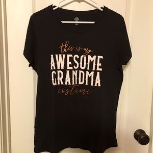 Cute ‘This is my awesome grandma’ black shirt. Size Large